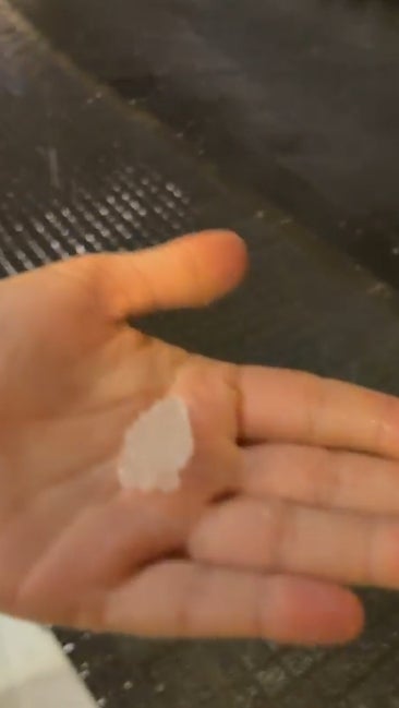 The size of hailstone collected in a resident's hand during the intense storm in Alhaurín el Grande.