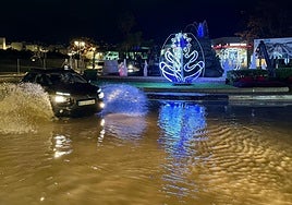 A driver takes a roundabout on Avenida Picasso in San Pedro.
