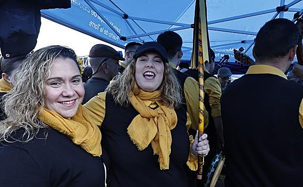 Yolanda Rico, with her baton as head of her group.
