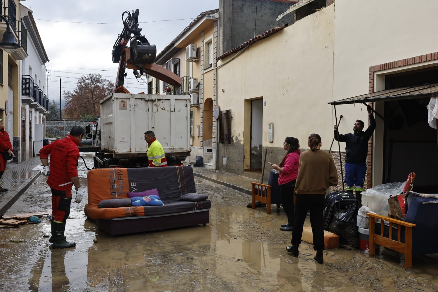 In pictures: Malaga town mops up after a night of torrential rain and the Guadalhorce river at its highest level on record