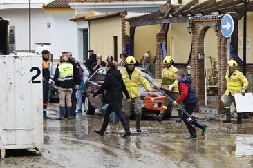In pictures: Malaga town mops up after a night of torrential rain and the Guadalhorce river at its highest level on record