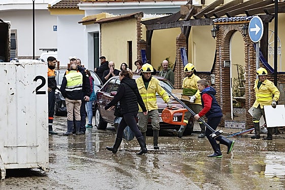 In pictures: Malaga town mops up after a night of torrential rain and the Guadalhorce river at its highest level on record