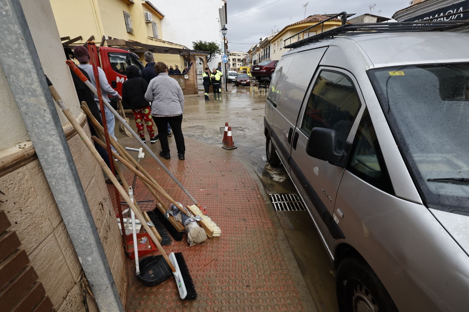 In pictures: Malaga town mops up after a night of torrential rain and the Guadalhorce river at its highest level on record