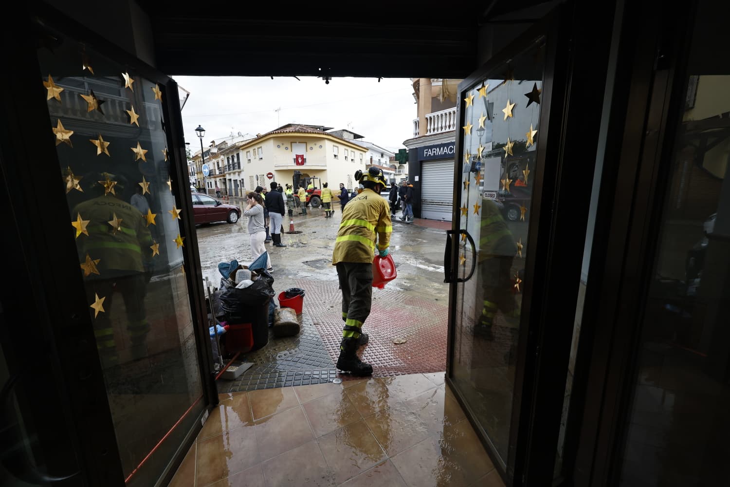 In pictures: Malaga town mops up after a night of torrential rain and the Guadalhorce river at its highest level on record