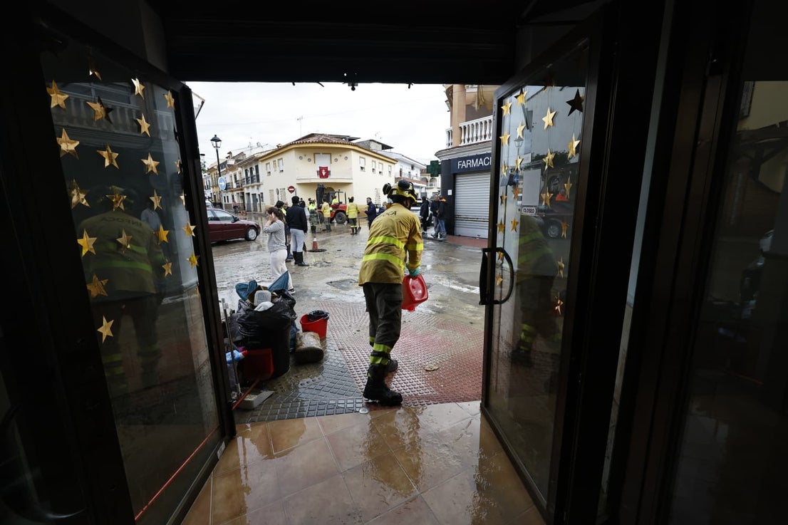 In pictures: Malaga town mops up after a night of torrential rain and the Guadalhorce river at its highest level on record