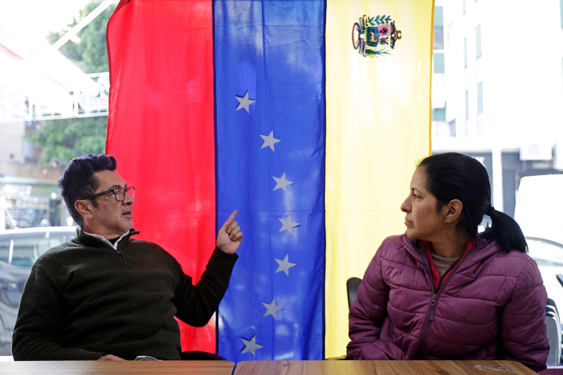 Javier Durán points to the stars on the Venezuelan flag, expressing his fear that the republic will become the 52nd star of the American one.