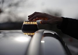 A V-16 roadside warning beacon.