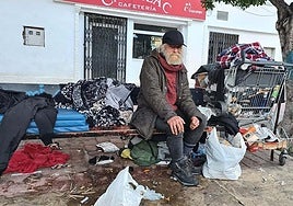 Lutz sits on the bench in Salobreña where he sleeps and where he was allegedly assaulted.