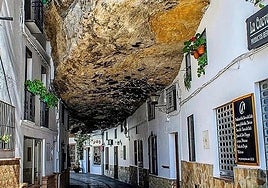 One of the streets of Setenil de las Bodegas covered with rock.
