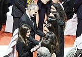 The King and Queen of Spain offering their condolences to the victims' families.