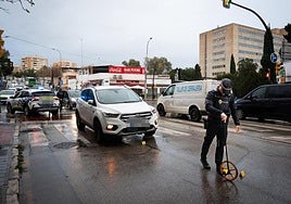 A police officer at the accident scene in Malaga early on Friday morning.