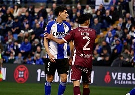 Antequera's Antón marks an opponent during Sunday's clash.
