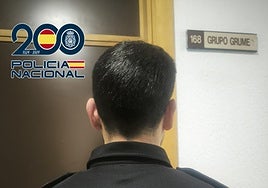 A National Police officer in front of the minors unit in Malaga.