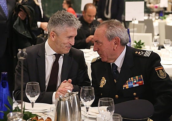 Fernando Grande Marlaska with José Ángel González.