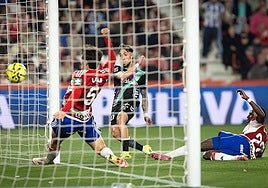 Malaga's David Larrubia forces the ball in from close range.