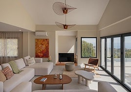 Natural light bathes warm materials, creating highly habitable and serene proportions.