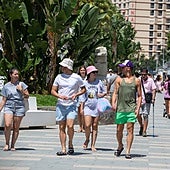 Tourists on Almuñécar's promenade during summer 2025