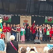 Members of the Welsh Society Costa del Sol on stage at the start the event.
