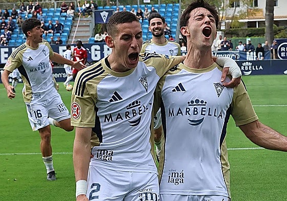 Jorge Álvarez and José Cambra celebrate Marbella's second goal against Sevilla Atlético.