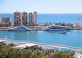 Two of the megayachts currently moored in the Malaga marina.