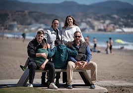 The Enamorado-Mena family, with their two older biological children and two foster children.