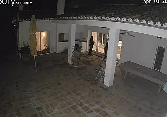 Security cameras captured two of the suspects at one of the houses.