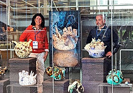 Ceramicist and industrial engineer Concha Cuadra and photographer Santiago Martínez de Septién at the exhibition at the Cern centre in Geneva.
