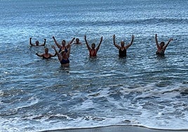 The Saltwater Sisters group enjoy a dip in the sea.