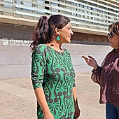 Toni Morillas and Trinidad Salcedo talking in front of a Malaga municipal building.