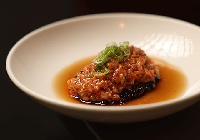 Red tuna belly tartare with slow-cooked tomatoes and a reduction of oloroso sherry and vermouth.