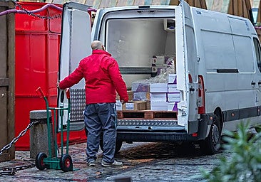 A delivery company employee during his working hours.