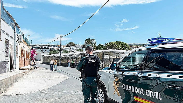 A Guardia Civil officer on patrol in El Canalillo, Almeria province.