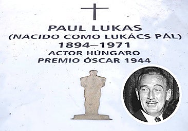 A close-up of the new headstone of Oscar-winning actor Paul Lukas, shown in the circular photograph.