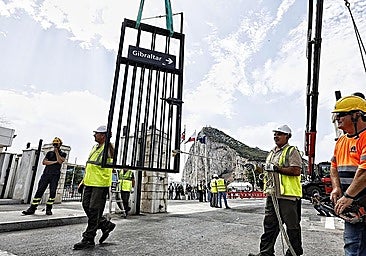 A symbolic moment as part of the fence is removed.