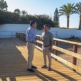 Municipal officials visit the new footbridge.