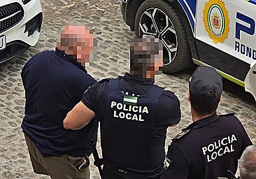 The Local Police accompanying the man who threatened the Mayor of Ronda.