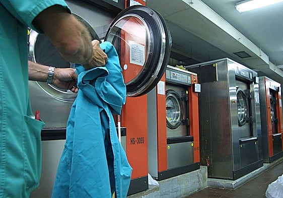 A 22-year-old worker dies after becoming trapped in a machine at a laundrette in Toledo