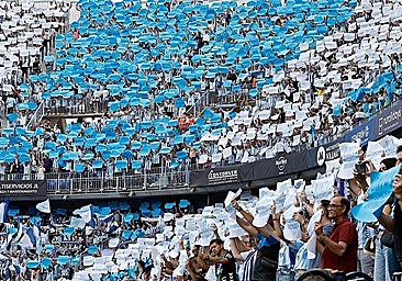 Malaga fans display a mosaic inside La Rosaleda stadium during a recent game.