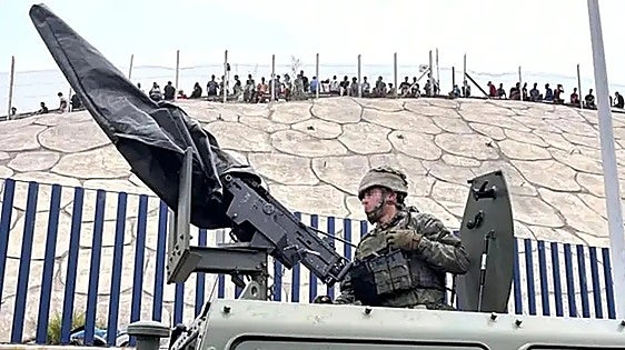 Spain's Defence Ministry cancels all leave for military personnel in Ceuta, while the Interior Ministry restricts holidays amid risk of another influx