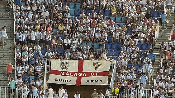 Guiri Army flag at La Rosaleda stadium.