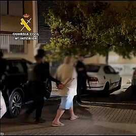 One of the men being arrested