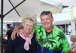 Fabienne Paques, founder of ACE, with a volunteer during a fundraising event earlier this year.