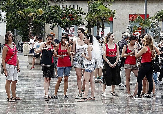 A hen party on a street in Valencia.