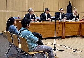 The defendants in court