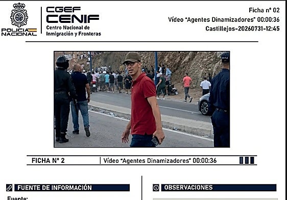 Photo of one of the pages of the report showing a photograph of one of the alleged "facilitators".