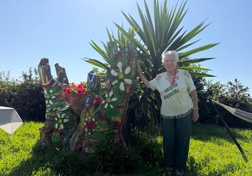 Kandy poses for IDEAL next to one of the trees in the garden of her home in Carchuna.