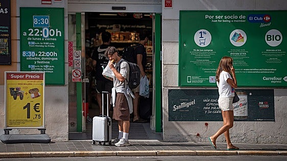 Supermarkets targeting tourists are springing up all over Malaga city centre