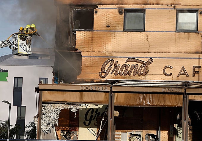 Firefighters working from outside.