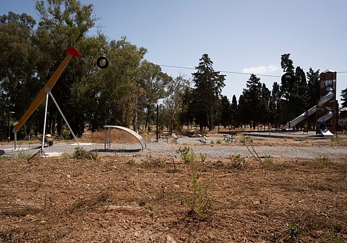 An area where a slide and a zip line have been installed.