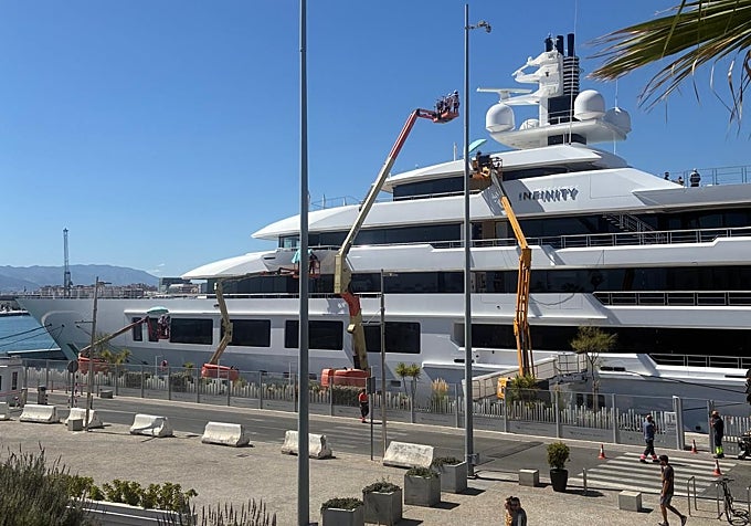 Maintenance work on the decks of the 'Infinity'.